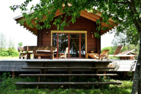 Charming wooden house on the private shore of the lake Daugų Seniūnija